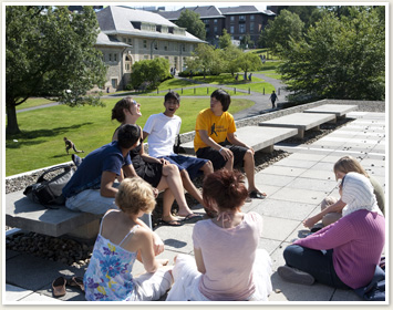 Summer Session students sitting outside Olin Library